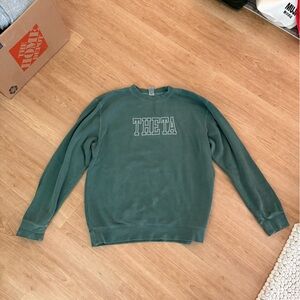 Theta merch